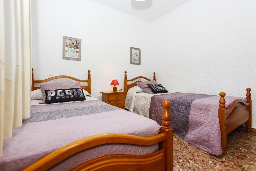 Postel nebo postele na pokoji v ubytování 014 Villa Colonia - Deniasol