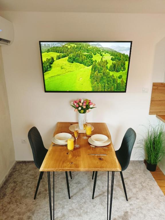 TV a/nebo společenská místnost v ubytování Apartmán u Ovečků - Nová Paka
