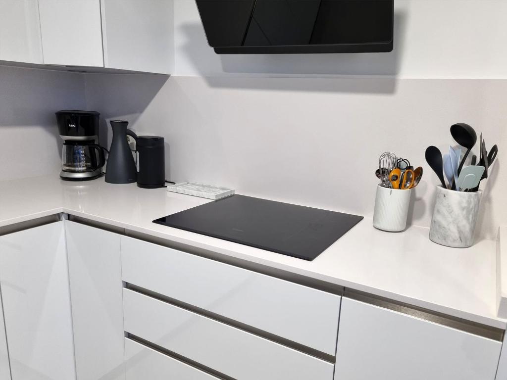 Kuchyňa alebo kuchynka v ubytovaní Brand new Exclusive apartment, 100 meter from the Beach