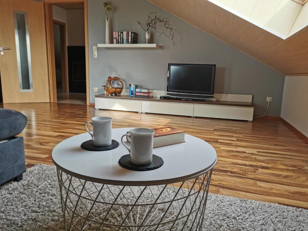 TV a/nebo společenská místnost v ubytování Apartment Hasselstrasse
