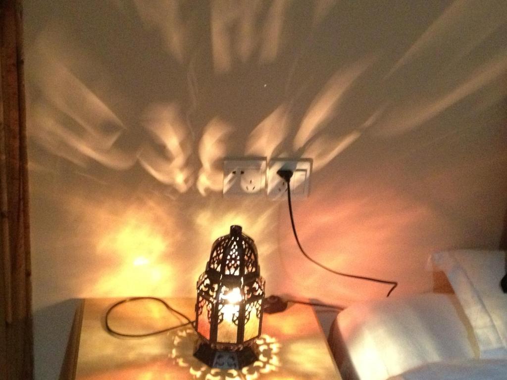 a lamp sitting on a table in a room at 大理涵墅 HillSea in Dali