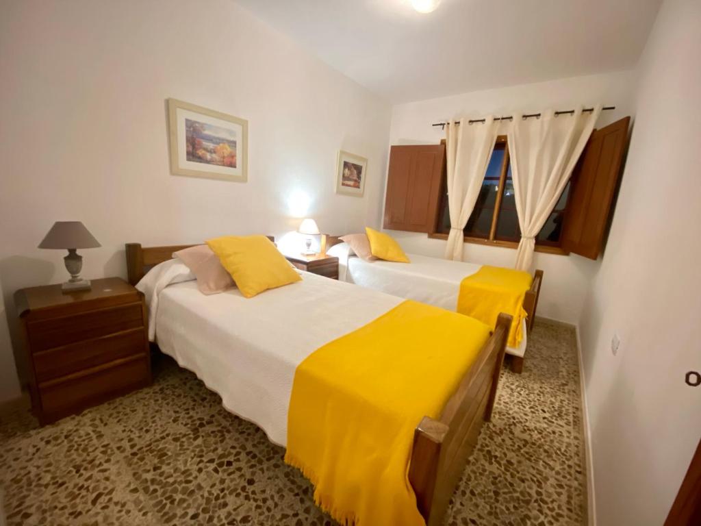 Postel nebo postele na pokoji v ubytování Vv. Casa La Fuente II