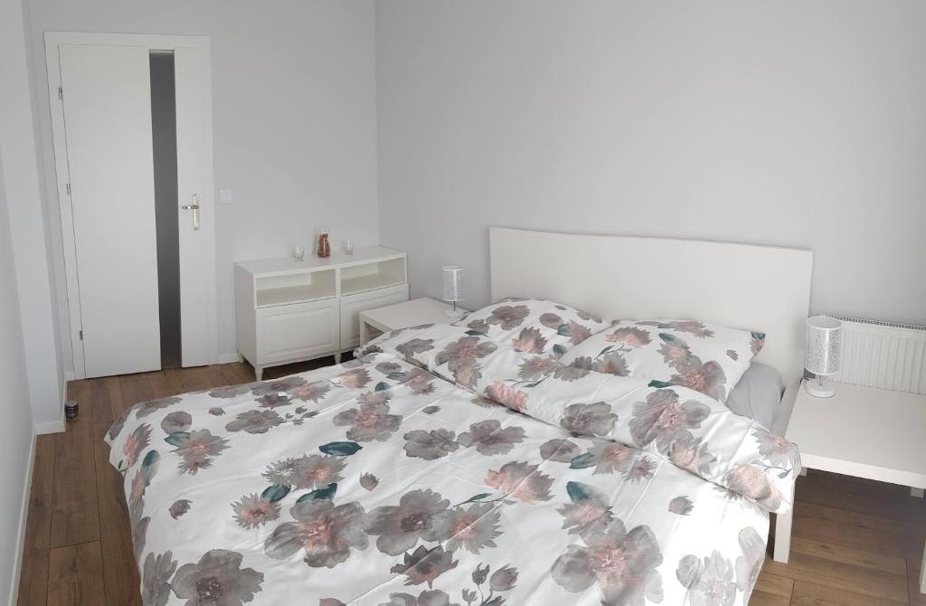Posteľ alebo postele v izbe v ubytovaní Apartamenty Gdańsk Angielska Grobla
