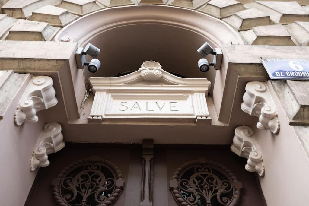 a building with a sign that says sale on it at Salve station in Krakow