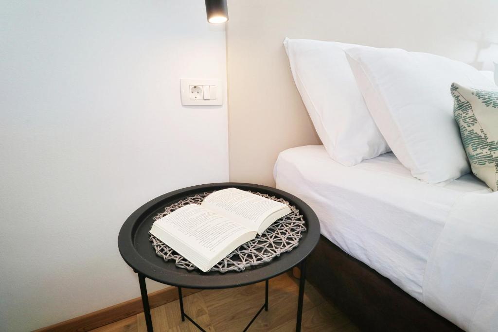 Postel nebo postele na pokoji v ubytování Luxury Villa Magico