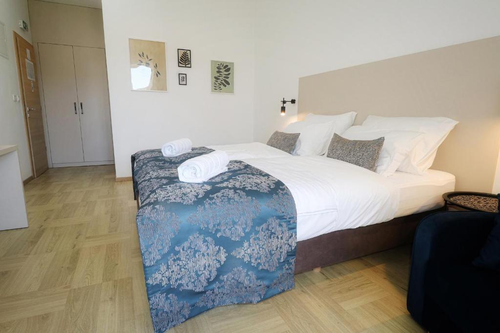 Postel nebo postele na pokoji v ubytování Luxury Villa Magico