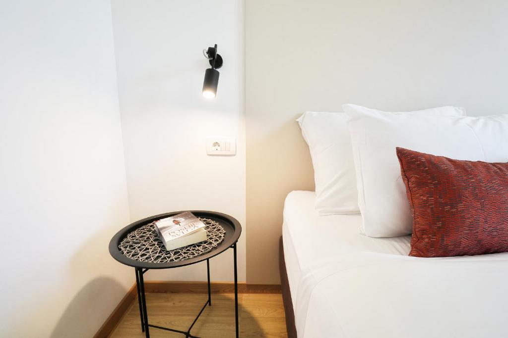 Postel nebo postele na pokoji v ubytování Luxury Villa Magico