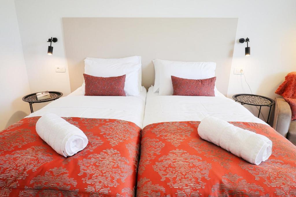 Postel nebo postele na pokoji v ubytování Luxury Villa Magico