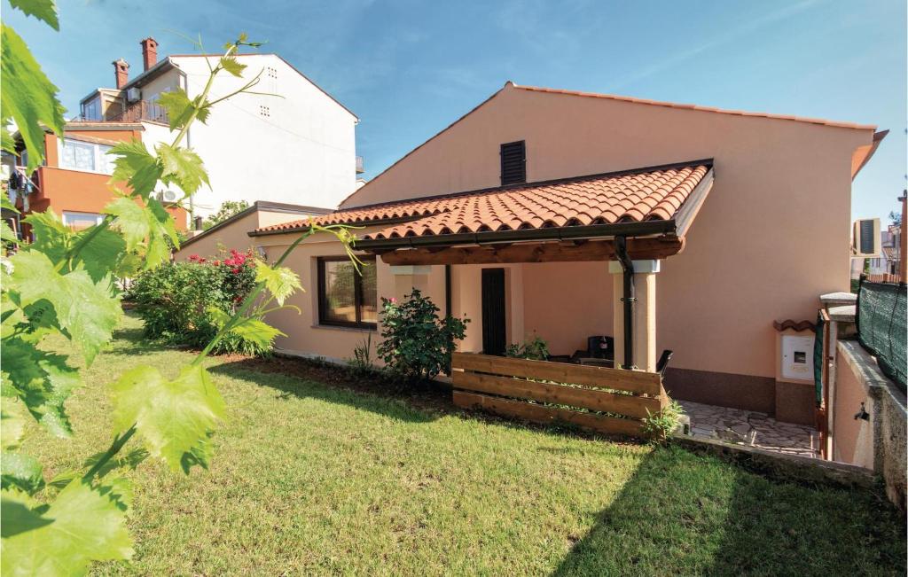 a small house with a pitched roof at Gorgeous Home In Pula With Wifi in Pula