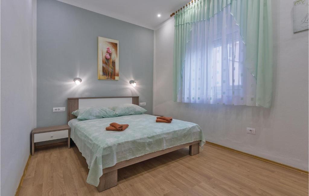 Posteľ alebo postele v izbe v ubytovaní Gorgeous Home In Pula With Wifi