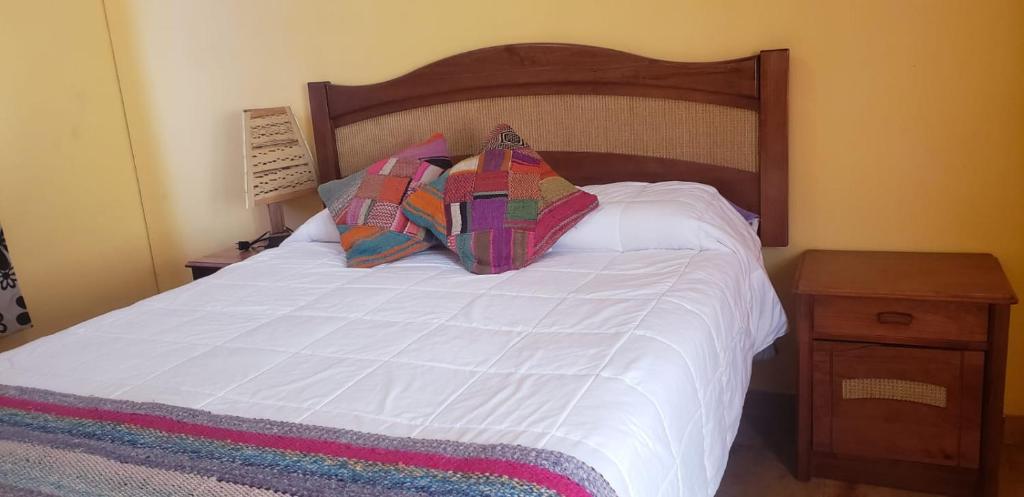 Giường trong phòng chung tại Casas Particulares, Tipo Cabañas.