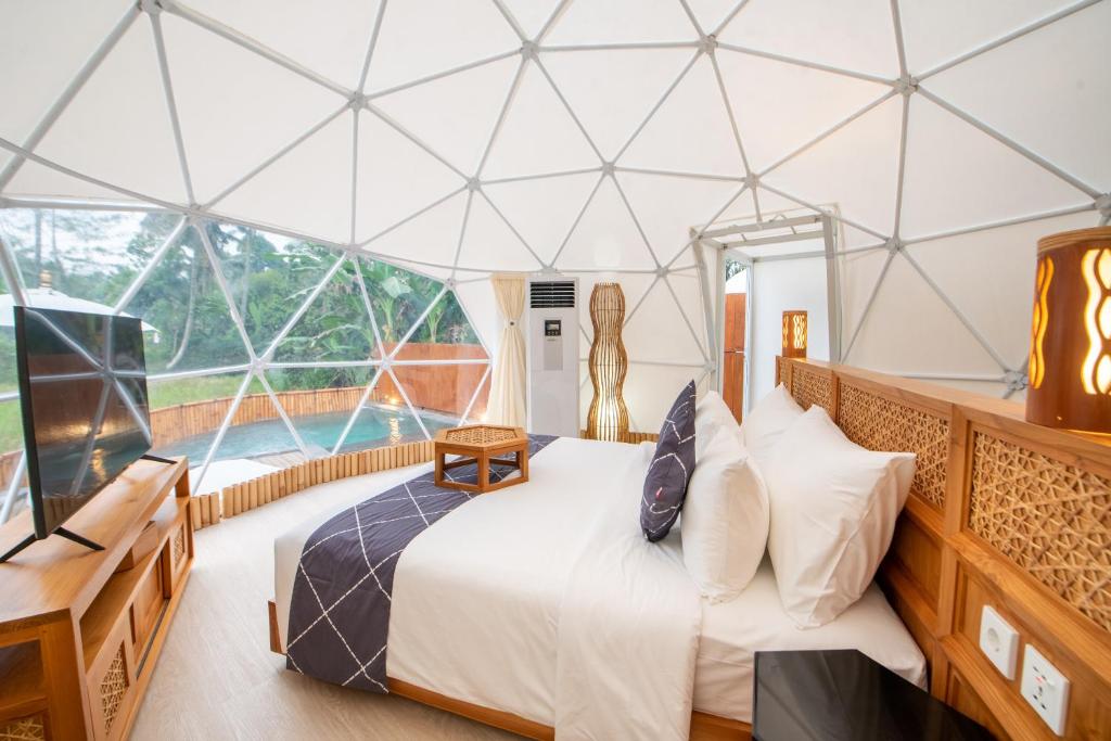 Postel nebo postele na pokoji v ubytování Triyana Resort and Glamping