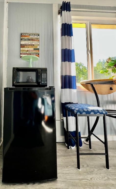 Kuchyň nebo kuchyňský kout v ubytování Sunshine Cottage