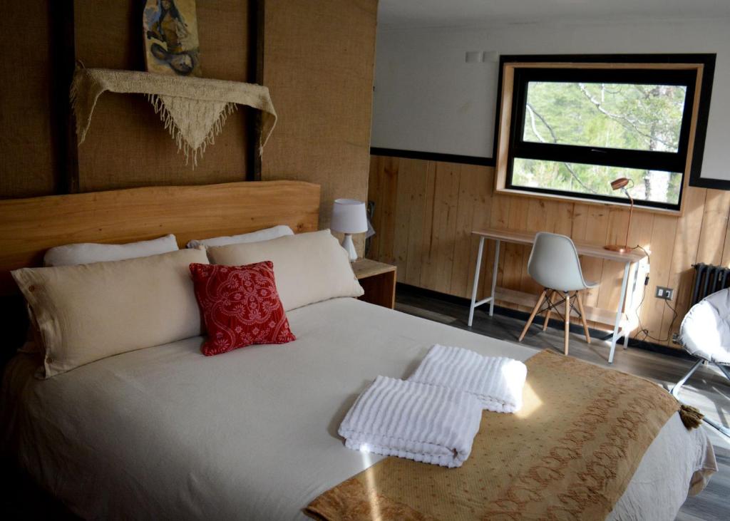 Postel nebo postele na pokoji v ubytování La Colmena eco lodge