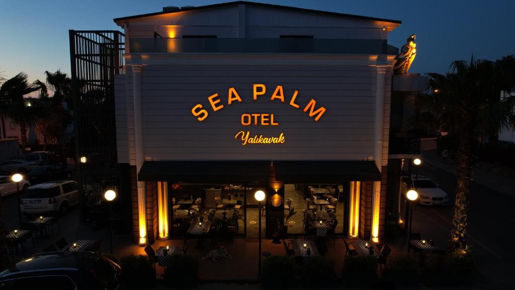 a restaurant with a sign that reads sea palin old banquet at Sea Palm Otel Yalıkavak in Yalıkavak