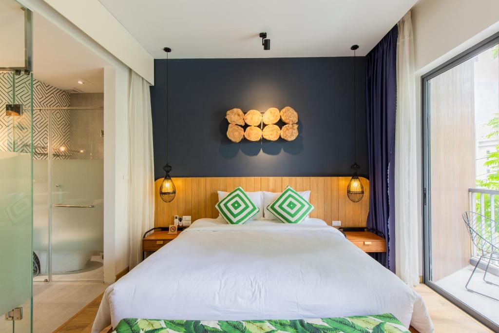 Giường trong phòng chung tại Seaforest Hotel by Haviland