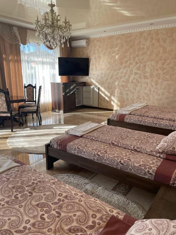 Postel nebo postele na pokoji v ubytování Hotel Ashad