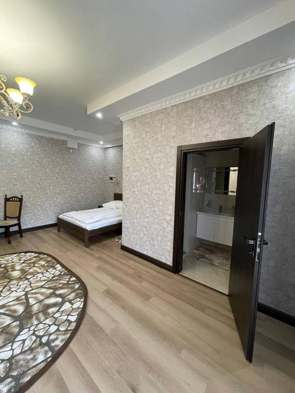 Postel nebo postele na pokoji v ubytování Hotel Ashad