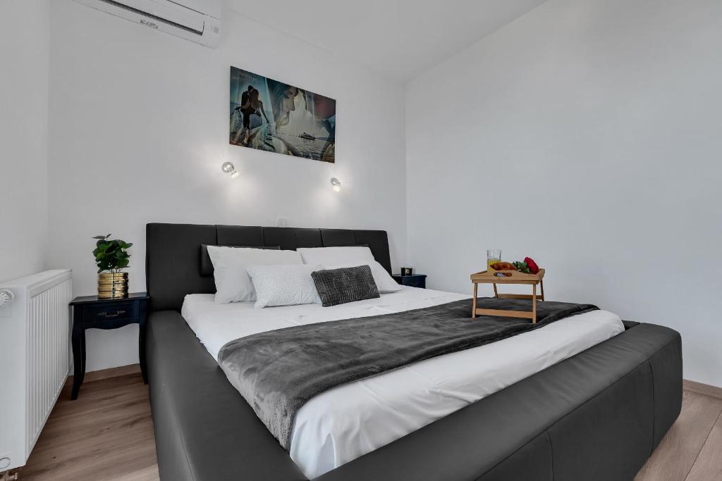 Postel nebo postele na pokoji v ubytování Apartment Apricus