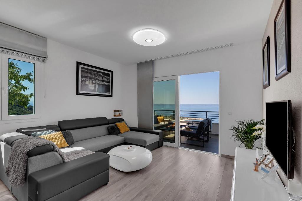 TV a/nebo společenská místnost v ubytování Apartment Apricus