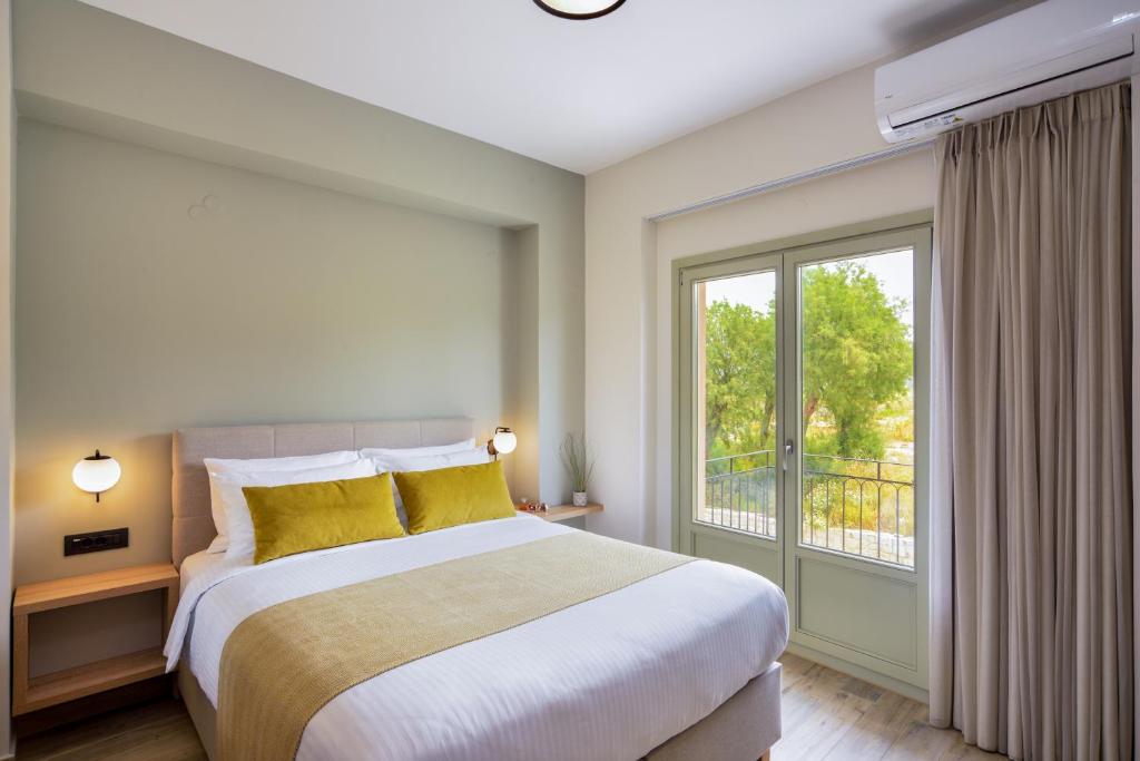 Postel nebo postele na pokoji v ubytování Dandelion apartments