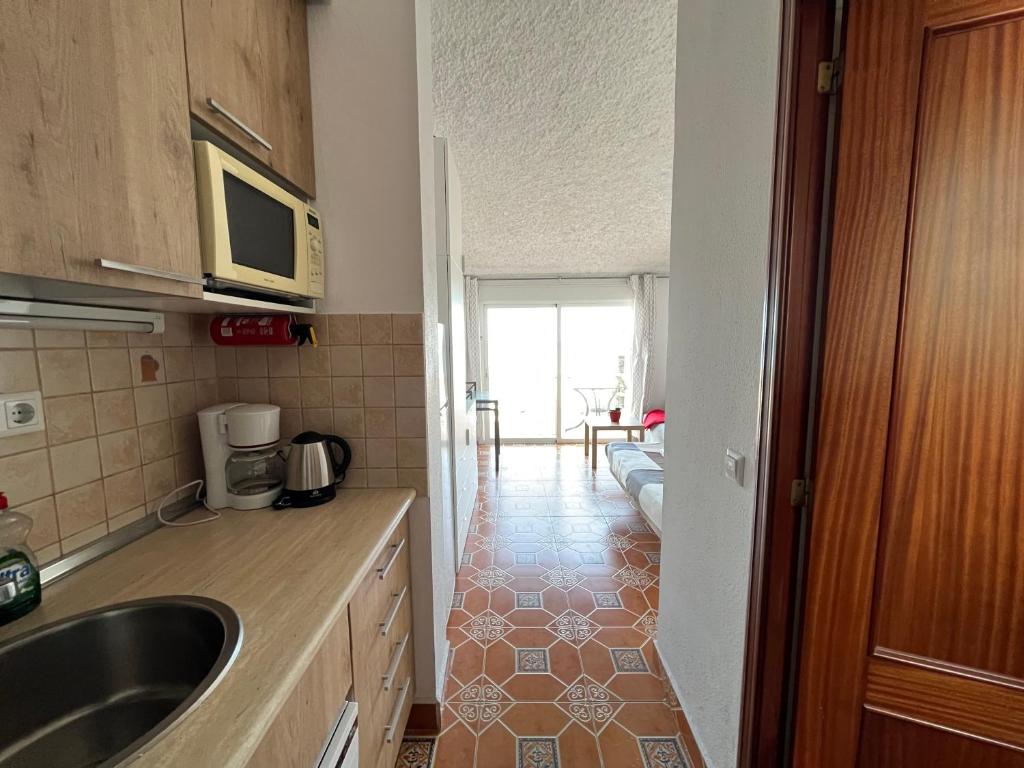 Kuchyň nebo kuchyňský kout v ubytování Apartments Bahia Dorada