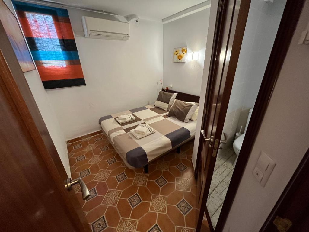 Postel nebo postele na pokoji v ubytování Apartments Bahia Dorada
