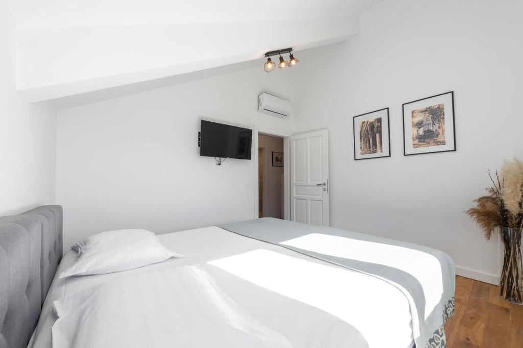 Vuode tai vuoteita majoituspaikassa Aria Suite & SPA Dubrovnik