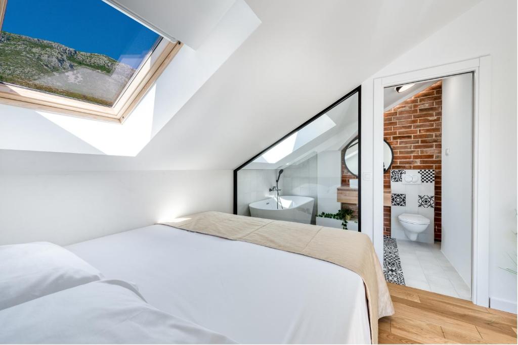 Vuode tai vuoteita majoituspaikassa Aria Suite & SPA Dubrovnik