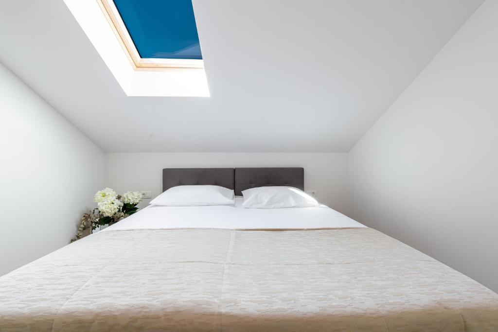 Vuode tai vuoteita majoituspaikassa Aria Suite & SPA Dubrovnik