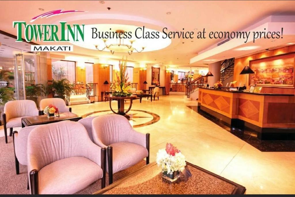 a lobby of a business class service center at company prices at Tower Inn Makati Business Hotel in Manila
