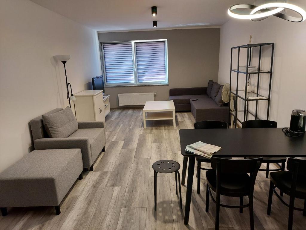 Posedenie v ubytovaní Uroczy apartament w ścisłym centrum Giżycka