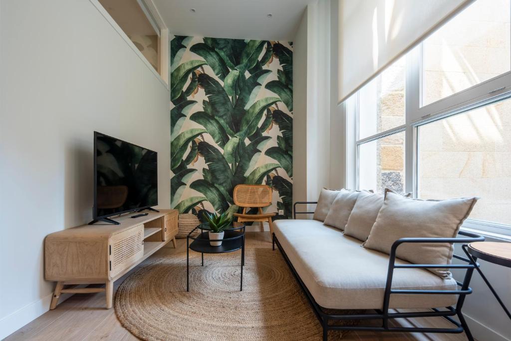 TV a/nebo společenská místnost v ubytování Bow Homes by Como en Casa