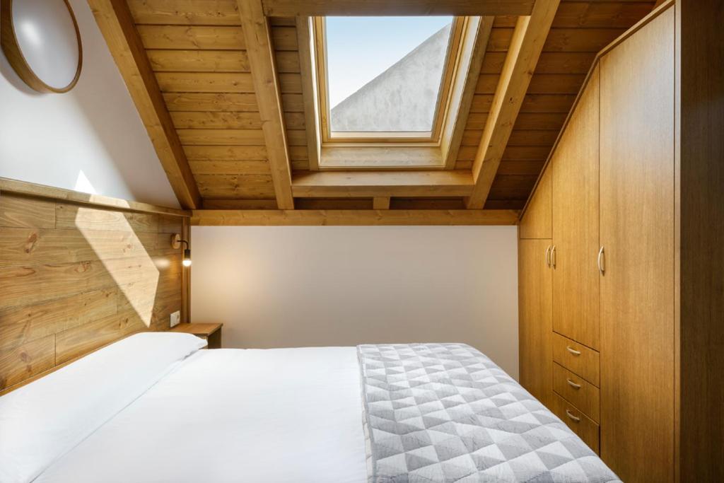 Postel nebo postele na pokoji v ubytování CASA LO PIPAU