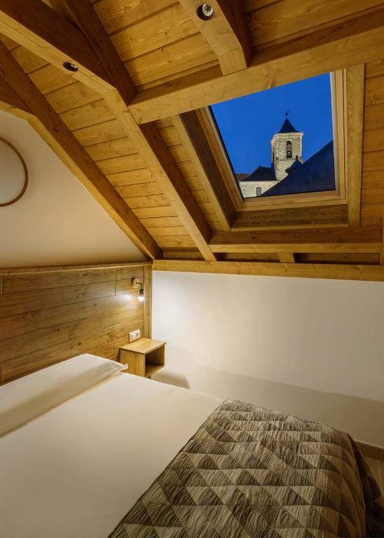 Postel nebo postele na pokoji v ubytování CASA LO PIPAU
