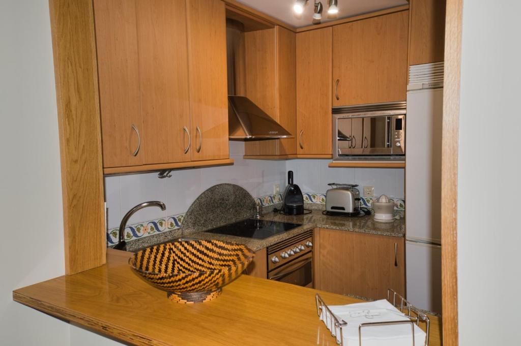 Kuchyňa alebo kuchynka v ubytovaní Apartamento turístico en Sanxenxo