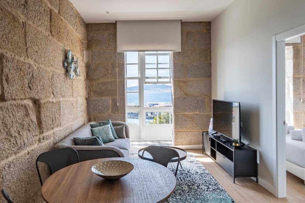 TV a/nebo společenská místnost v ubytování Bow Homes by Como en Casa