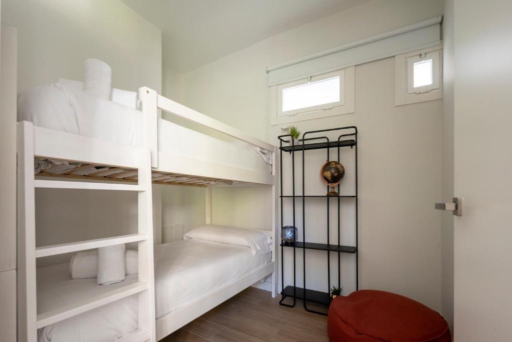 Postel nebo postele na pokoji v ubytování Bow Homes by Como en Casa