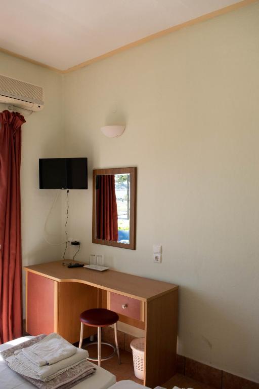 TV a/nebo společenská místnost v ubytování Mirtia Hotel