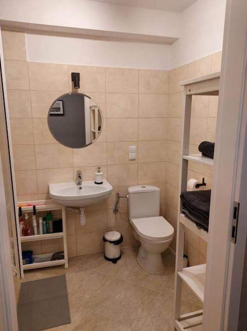 Kúpeľňa v ubytovaní Uroczy apartament w ścisłym centrum Giżycka