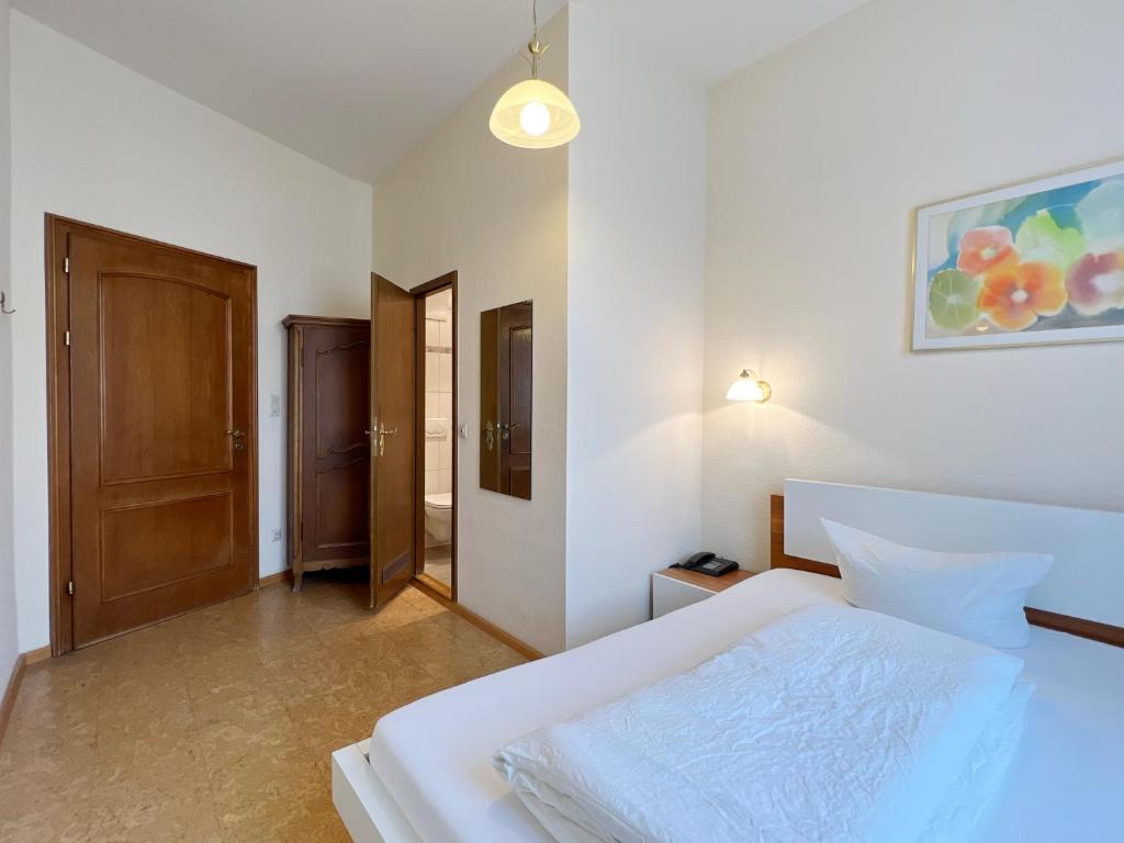 Postel nebo postele na pokoji v ubytování Hotel Kühler Krug