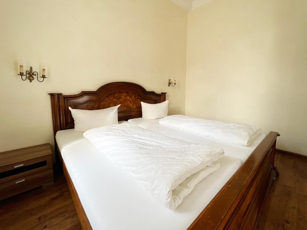 Postel nebo postele na pokoji v ubytování Hotel Kühler Krug