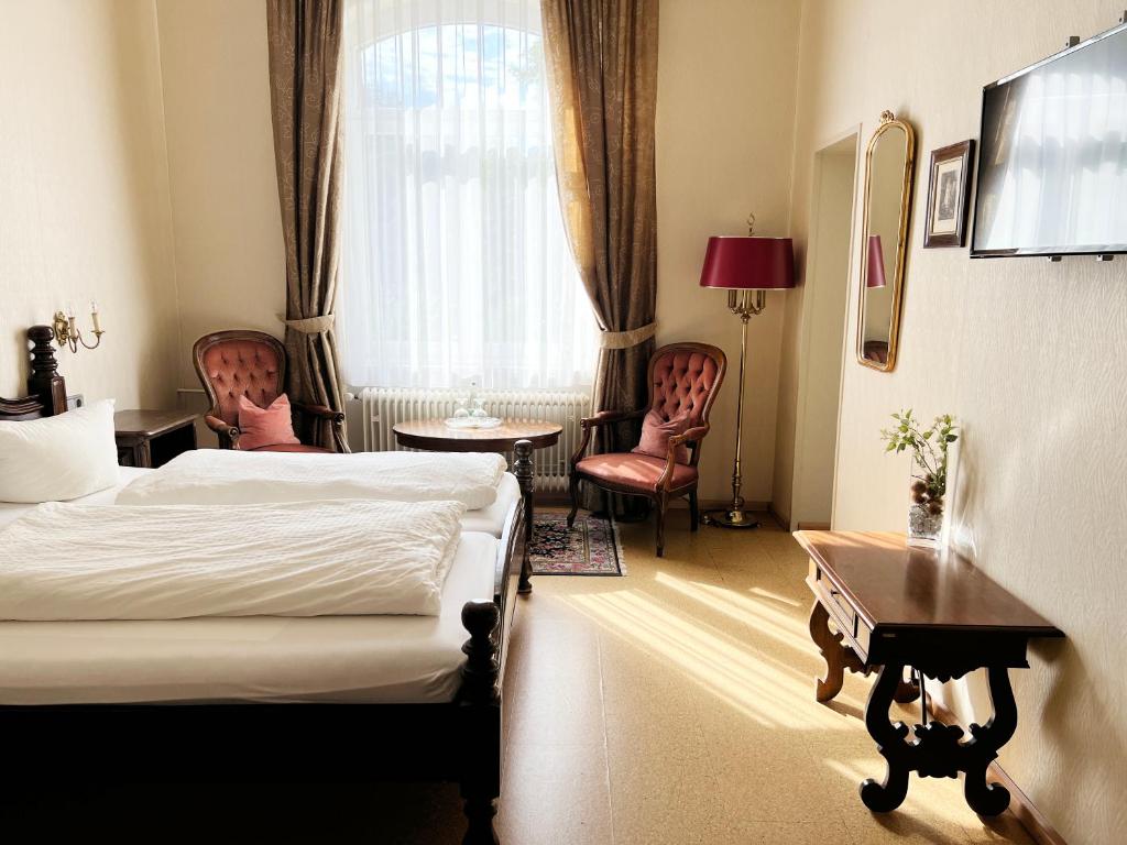 Postel nebo postele na pokoji v ubytování Hotel Kühler Krug