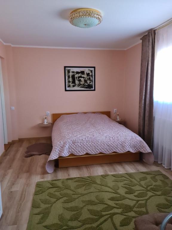 Postel nebo postele na pokoji v ubytování Smilgas