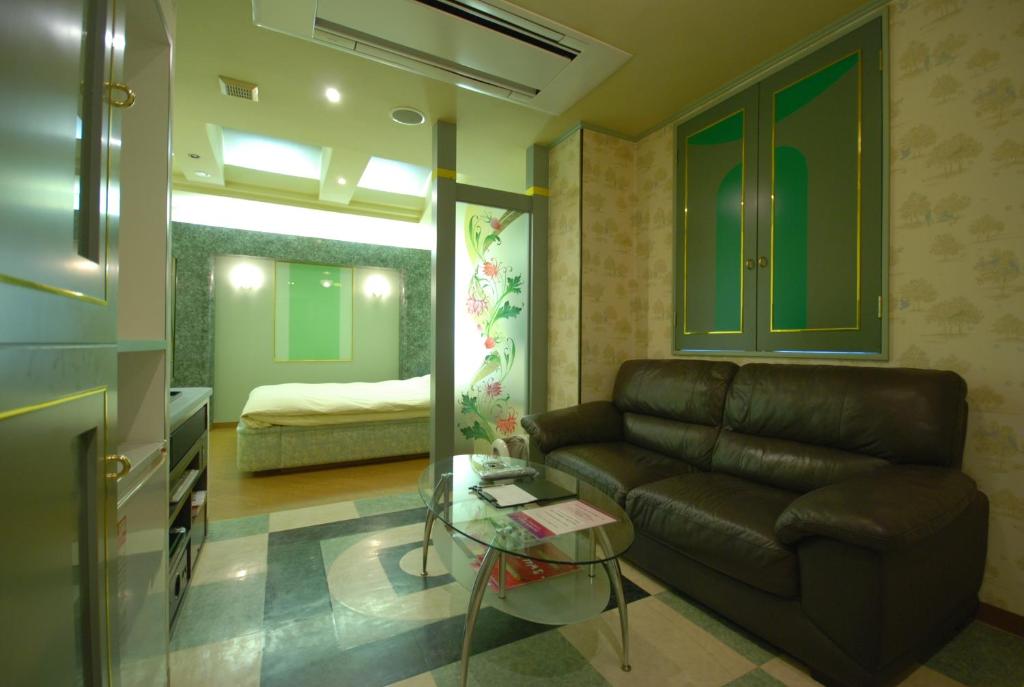 Posezení v ubytování HOTEL WiLL EX 大高 レジャーホテル