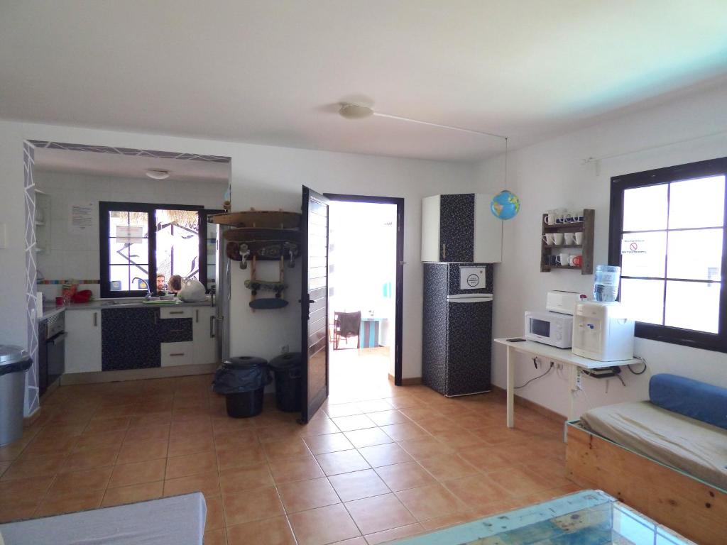 Kuchyň nebo kuchyňský kout v ubytování La Fresa Hostel