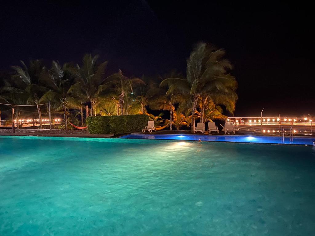 Bazén v ubytování Resort Playa Azul Departamentos nebo v jeho okolí