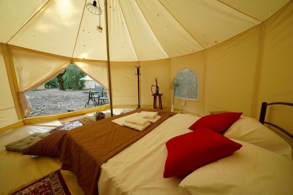 Postel nebo postele na pokoji v ubytování Paliouri Luxury Bungalows