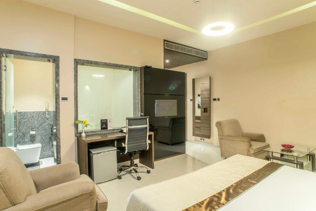 Posezení v ubytování The Citi Residenci Hotel - Durgapur
