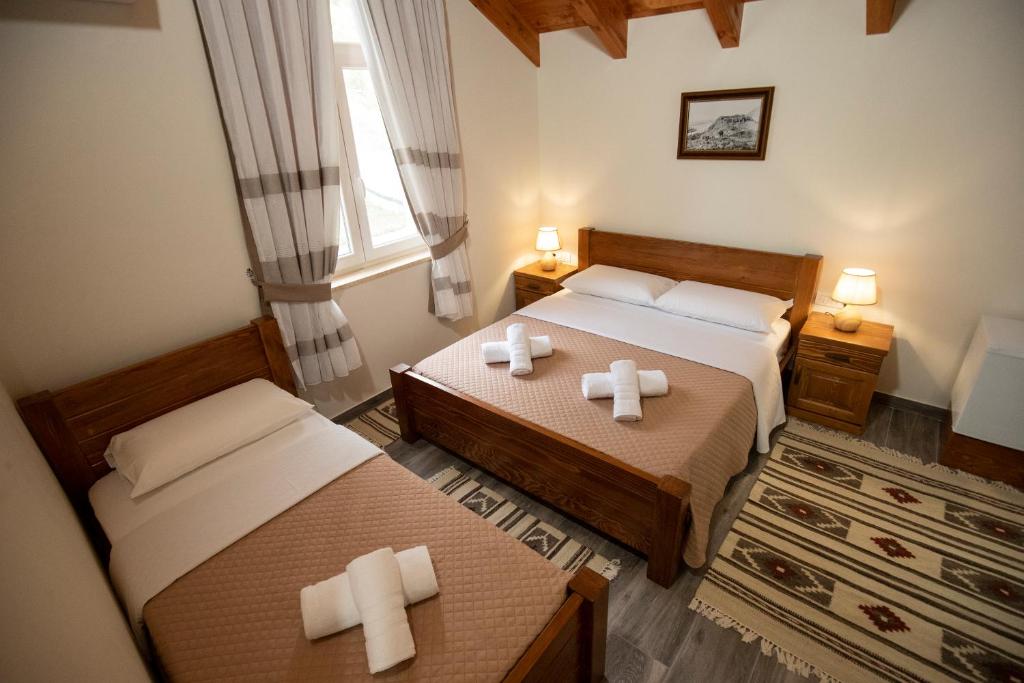 Postel nebo postele na pokoji v ubytování Xhuli Guesthouse